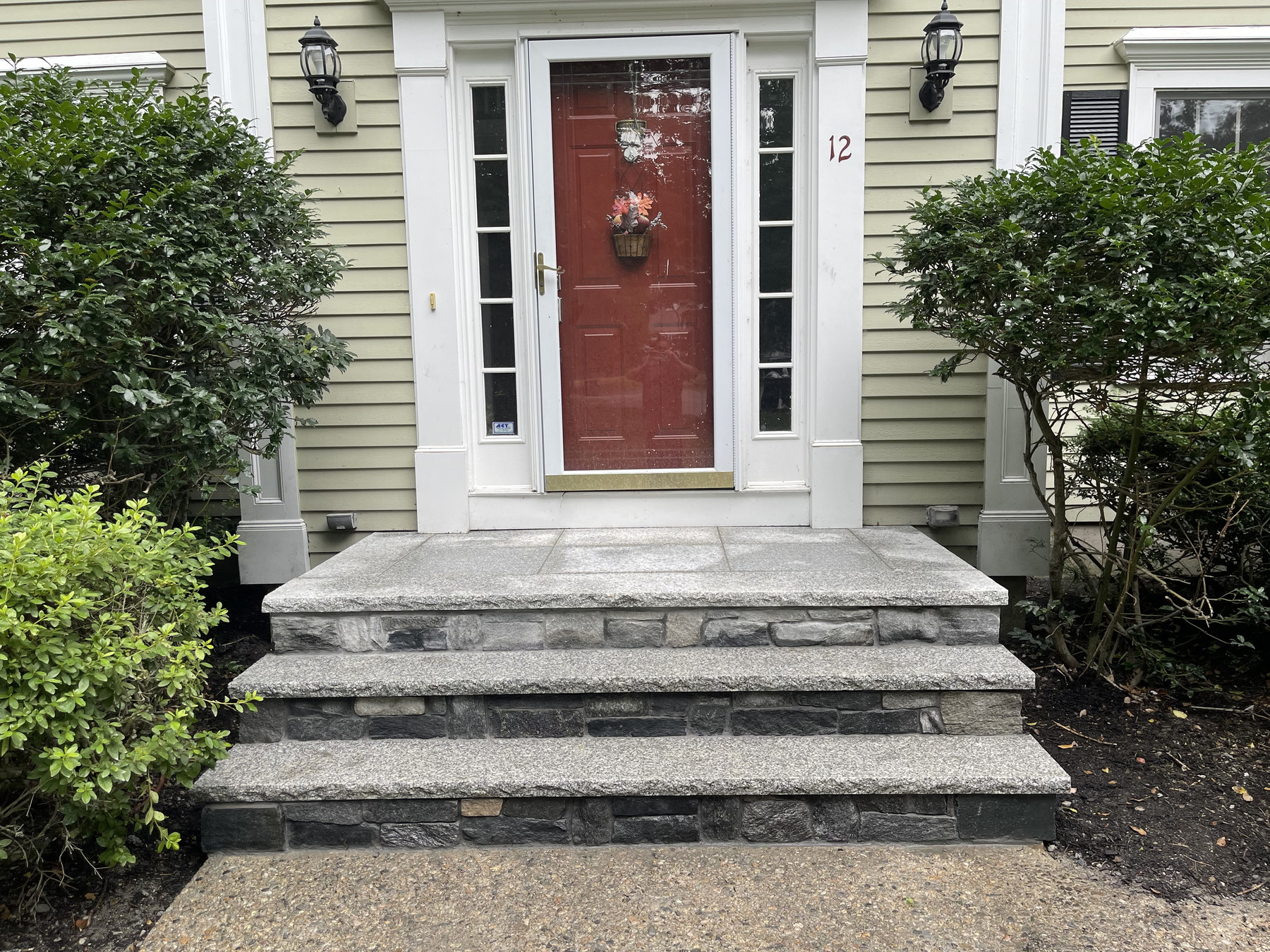 Stone Veneer Steps with Salt-and-Pepper Granite Treads & Platform — Medfield, MA